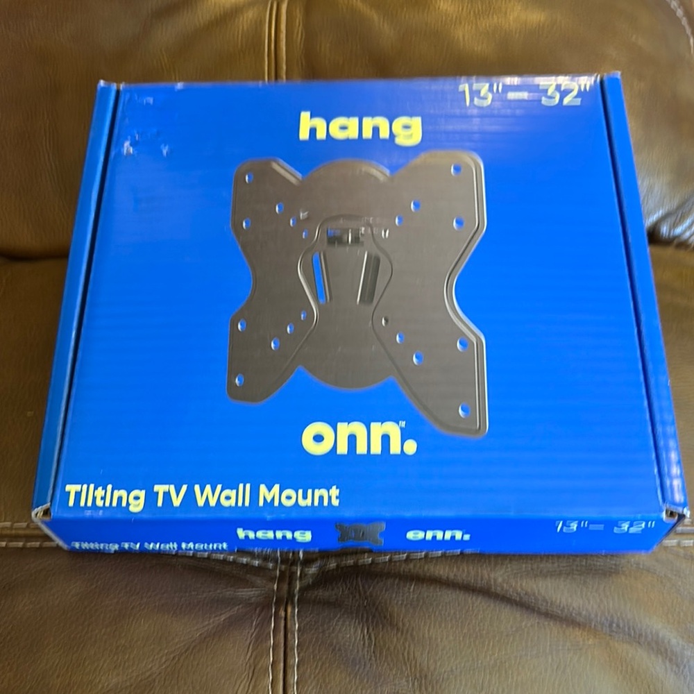 Black TV Wall Mount for Optimal Storage and Organization